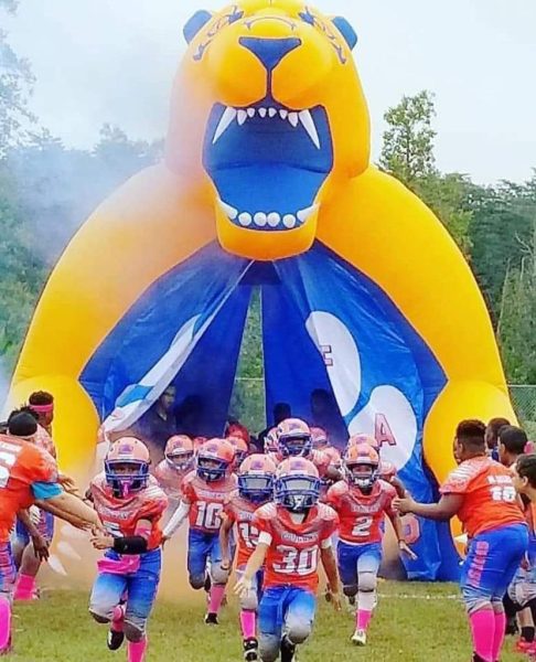 Spotsy Cougars Game Day Tunnel Run – Youth Football in Action